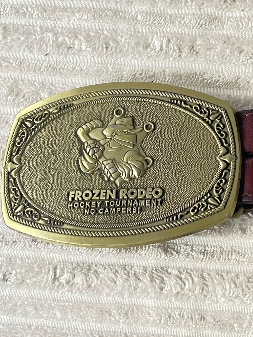 Vintage Frozen Rodeo Hockey Tournament buckle & Brown Braided Leather Concho